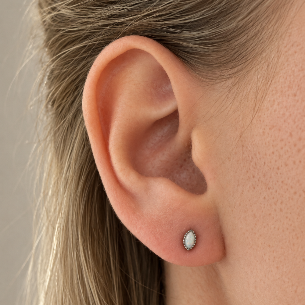 Titanium Labret Decorative Oval Opal On Ear
