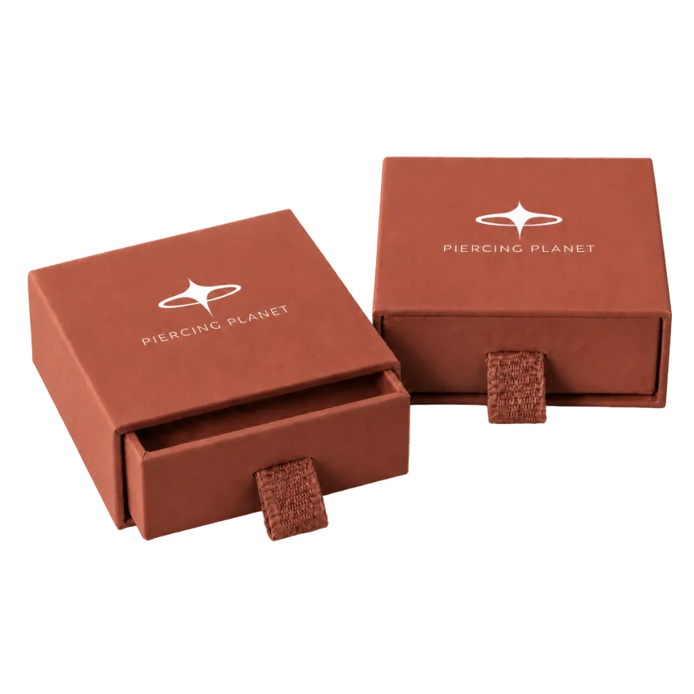 coffret cadeau avec le logo piercing planète